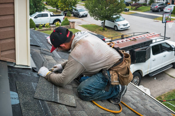 Professional Gutter Repair And Installation technician working in Aberdeen, OH